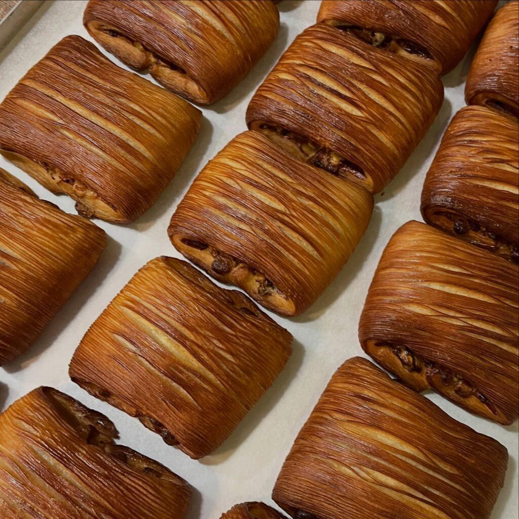 Glossy egg-washed pastries sprayed with an even coat